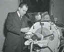 Richard Nixon Talking to an Iron Lung Patient