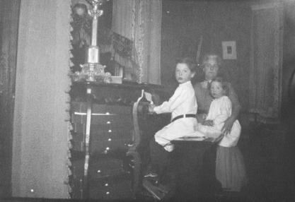 Virginia Apgar, her brother Lawrence, and her mother at home, ca. 1912